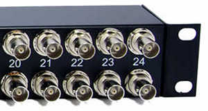 [Photo of 24 E1 Balun Panel with BNC coax connectors]